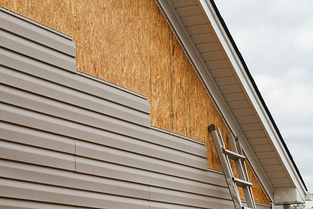 Professional Siding technician working in Banco, VA